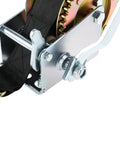 Close-up of 600 Lb Heavy Duty Hand Winch with 6m rope and 2 inch polyester strap, showcasing beefy steel construction and gear.