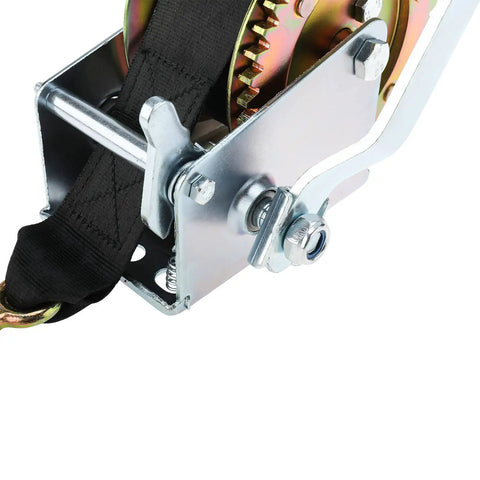 Close-up of 600 Lb Heavy Duty Hand Winch with 6m rope and 2 inch polyester strap, showcasing beefy steel construction and gear.