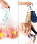 Hands using 4 Pack Large 5.5 Inch D Style Carabiner Hooks With Foam Cushioned Handles for carrying bags with ease.