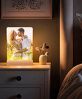 Six Pack Sublimation LED Photo Frames With Wood Stand 5 By 7 Inch USB Powered Night Lights on a bedside table