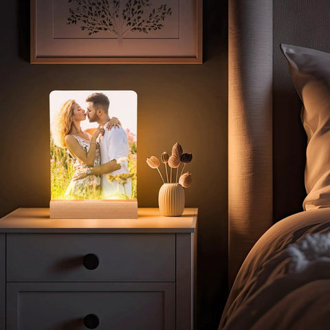Six Pack Sublimation LED Photo Frames With Wood Stand 5 By 7 Inch USB Powered Night Lights on a bedside table