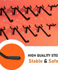 60 Piece Black Pegboard Hooks Set With 2, 4, And 6 Inch L Shaped Hangers For One Quarter Inch Pegboard installed on wall