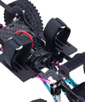 Close-up of Carbon Fiber LCG Chassis Frame Rail Kit For 1/24 RC Crawler Adds Low Center Of Gravity Handling Multiple Shock Mounts.