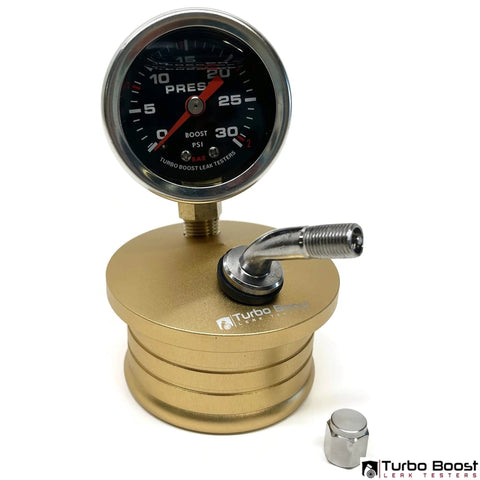 Turbo Boost Leak Tester front view: gold aluminum base with 0–30 PSI gauge and 3-inch inlet elbow.