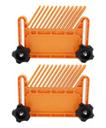 Heavy Duty ABS Nylon Featherboard That Keeps Kickback In Check And Grips Workpieces Rock Solid On Table Saws Band Saws Router Tables. Two orange clamps with black knobs.