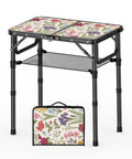 Small Camping Table With Vintage French Floral Pattern Folding Design Adjustable Height Lightweight Portable Picnic Table With Carry Handle For Patio Living Room And Travel, shown fully assembled with floral print top and carry case with handle.