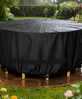 Round Outdoor Table And Chair Set Cover Fits 48 Inch Diameter By 28 Inch High Beefy Built 420D Waterproof UV Resistant Windproof Dustproof Black Patio Furniture Cover on table.