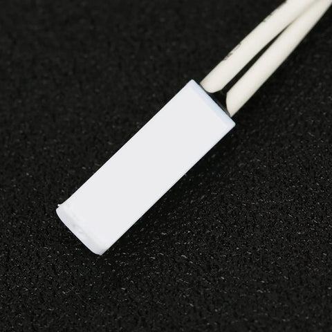 Close-up view of a 36V 10S Lithium Battery BMS featuring a white connector and wires for e-bike mods.