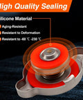 Close-up of 13 PSI Radiator Cap for Polaris Ranger and RZR models, featuring a red silicone seal and stainless steel housing.
