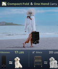 Person carrying a folded Beast 150L Collapsible Wagon Cart With 420Lb Heavy Duty Frame, All Terrain Wheels on the beach.