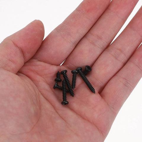Heavy Duty Self Tapping Screws Kit 500 Pcs Black Pan Head Carbon Steel 7 Sizes for Plastic Wood and Metal Quick DIY Installations with Strong Holds Pro Grade Fasteners for Heavy Duty Construction and Professional Needs, black screws in hand