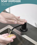 Close-up of hand using matte black LED kitchen faucet soap dispenser with pull down sprayer, a game changer for modern sinks.