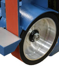 Close-up of Badass 2 X 48 Two Wheel Belt Grinder showing contact wheel and sander belt for metal crafting jobs.