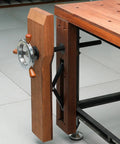 Heavy Duty Badass Bench Screw Vise With Quick Inertia Crank Wheel and Double Brace Brackets mounted on workbench for woodworking.