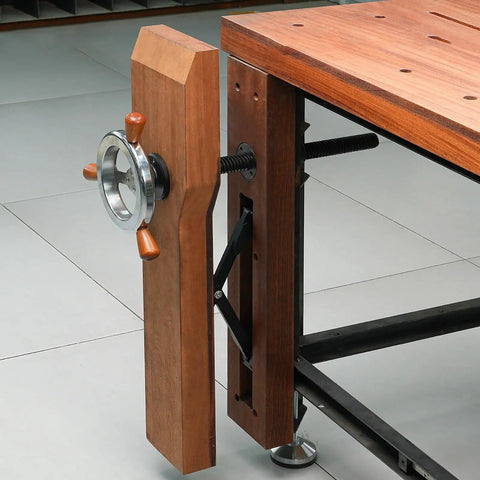 Heavy Duty Badass Bench Screw Vise With Quick Inertia Crank Wheel and Double Brace Brackets mounted on workbench for woodworking.