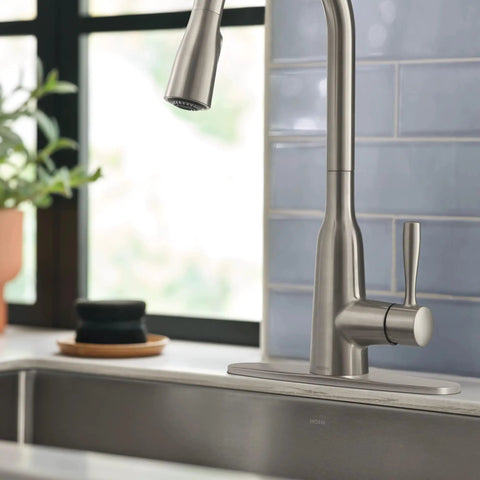 Top Shelf Stainless Steel Pull Down Kitchen Faucet Featuring One Handle High Arc Design with smooth spray hose in kitchen.