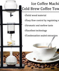 Hella Smooth Cold Brew Drip Coffee Maker With 1000 Ml Glass Pitcher And Sturdy Wooden Base, featuring a sleek, solid wood structure for coffee brewing.