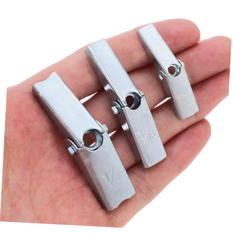 Hand holding steel pieces from Heavy Duty Toggle Bolt And Wing Nut Kit For Drywall Walls 48 Piece Set Tough As Nails Easy Install Wall Anchors
