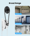Garage door jackshaft chain hoist with black sprocket on housing; shown with garages, warehouses and roller shutters.