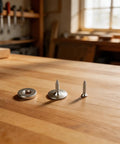 Magnetic Cabinet Door Catch With 15 Lbs Magnetic Hold Heavy Duty Stainless Steel Drawer Latch components on wood table.