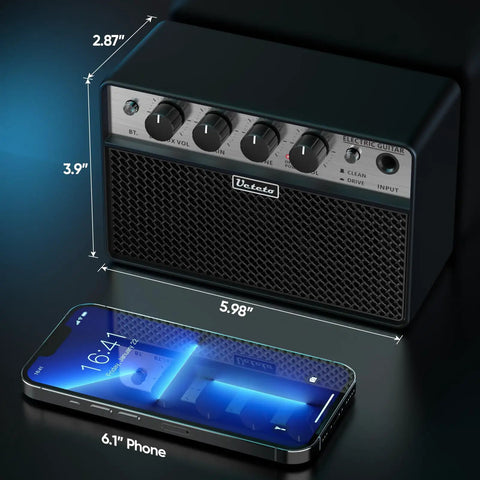 10W Mini Guitar Amp Portable Practice Amplifier With Rechargeable Battery next to phone for size comparison