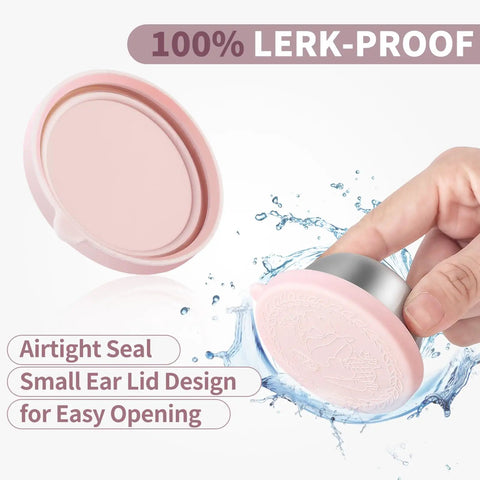 Airtight pink lid of an Eight Pack 1.6 Oz Portable Salad Dressing Container, showing leakproof design and easy grip feature.