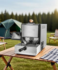 Skip The Shop Line And Roast Your Own Beans With This 200G Home Coffee Roaster on a wooden table outdoors, showing sleek design.