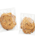 Clear Self Sealing Cellophane Bags 4x6 Inches 200 Pcs Resealable Bags For Cookies Candy And Treats Packaging Transparent Bakery Grade Bags With Easy Tear Grips For Quick Pack with cookies inside.