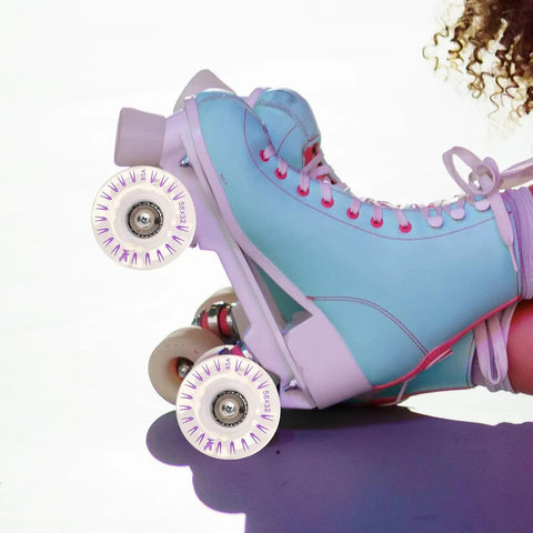 Blue quad skates with 2 Pack LED Roller Skate Wheels With Bearings for Quad Skates and Skateboards Light Up Indoor Outdoor Skating Gear.