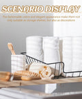 Bathroom scene with rolled towels and brush in a wire organizer