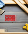 Check Screw Thread Sizes Fast With This Heavy Duty Aluminum Alloy Gauge Set For Metric And Standard Bolts That Fits In Your Pocket Perfectly. Red metric bolt thread gauge on wood surface
