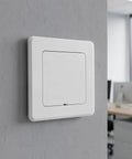 2 Pack Self Adhesive Access Panel For Drywall And Ceilings 4 X 4 Inch Inside Size Peel And Stick Pipe Hole Cover installed on a gray wall