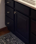 10 Pack Modern Cabinet Pull Handles in Gold Matte Stainless Steel Hardware for Kitchen and Dresser Drawers on black cabinets.