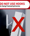 Image showing a large utility hook misused to hang a frame with a red cross overlay. 5 Pound Large Utility Hooks Kit With 14 Hangers And 16 Adhesive Strips Damage Free Wall Mounts With No Tools Needed Ideal For Home Kitchen And Office Organization notice.