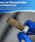 Gloved hand applying Workhorse High Temperature Copper Anti Seize Thread Lubricant to bolt for easy disassembly and maintenance.