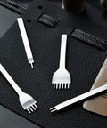 Leather Stitching Punch Kit With White Steel Prongs 5mm Pitch 1 2 4 6 Prong Tools on black leather background