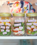 Compact Portable Label Maker Bundle Featuring Qwerty Keyboard Preview Display With Four Laminated Tape Rolls For Quick Home Office Organization Runs Totally Smooth Straight Up A Sweet Deal For Daily Grind And Quick Touch Ups: Jars of labeled salads in a refrigerator.