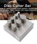Flat Bottom Punch Die Disc Cutter Set With 7 Piece 45 Steel Dies for jewelry making and crafting, shown on a workbench.
