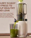 Aynefy 200W Cold Press Juicer With Wide Feed Chute For Whole Fruits extracting green juice into a glass with celery.