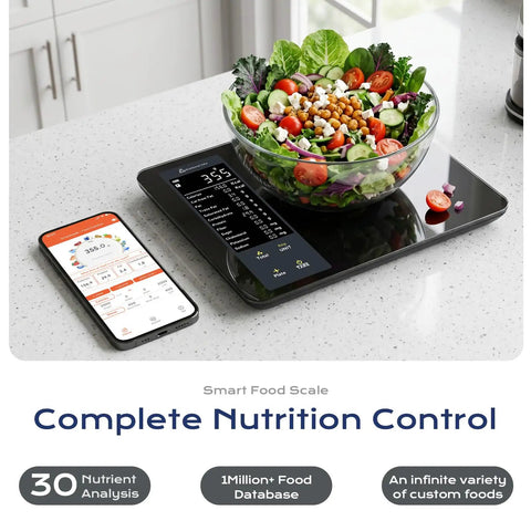 Food Scale With Nutritional Calculator For Tracking 30 Plus Nutrients Calories And Macros Bluetooth Kitchen Scale With Free App For Meal Prep Weight Loss Coffee Making And Daily Health Reports 22Lb Capacity on countertop with salad bowl and smartphone app display.