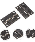 Detailed view of vintage bronze cabinet hinges with screws for wooden boxes and jewelry cases decorative chest hardware.