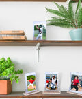 4 Pack Magnetic Card Holder Base For Trading Cards Display Stand Protector Case Base Perfect For Baseball Cards And Standard 35Pt Card Holders Great For Collectors To Show Off Your Favorite Cards At Home Or In The Office shown in use on wall shelves with photos.