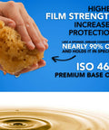 Wheel bearing grease promo graphic with Amazon logo, hand squeezing a sponge on a blue background and oil ripple.