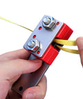 Close-up of Heavy Duty Banding Strapping Tool With Ergonomic Handle For Fast Packing And Carton Box Bundling, Tensioner and Cutter in use