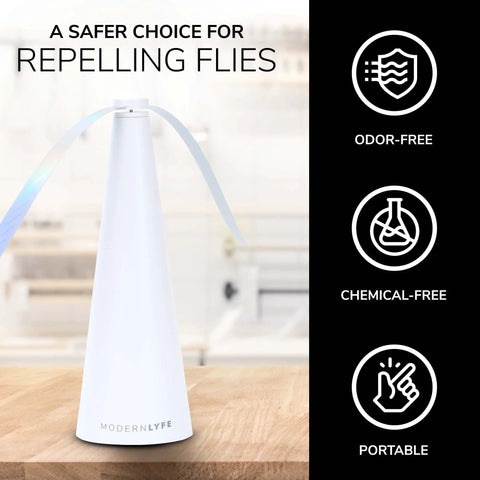 Dual Power Fly Fan For Outdoor Tables That Runs On USB Or AA Batteries Keeps Flies Away At Parties Picnics Restaurants And Camping White Spinner Bug Control Accessory with soft holographic blades on a wooden surface.