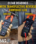 Digital Clamp Meter With True RMS And LoZ Auto Ranging displaying clear readings in sunlight and indoors.