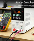 Adjustable DC Power Supply Benchtop 0 To 32V 0 To 10A Regulated Output With Digital Display next to multimeter on desk