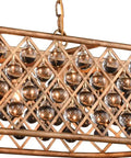 Modern Seven Light Crystal Pendant Fixture With Slick Polished Nickel Finish And Handcrafted Clear Sphere Globes For Dining Rooms, view from above showcasing crystal accents.