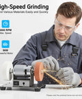 Man using Fiqhakl Mini Bench Grinder With Two Grinding Wheels Adjustable Variable Speed Electric Benchtop Sander for sharpening.
