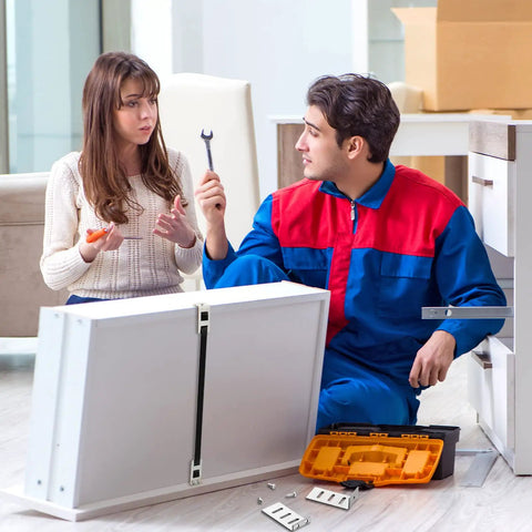 A couple discussing the Straight Shooter Drawer Repair Kit With Six Heavy Duty Support Brackets And Commercial Screws to upgrade cabinetry.